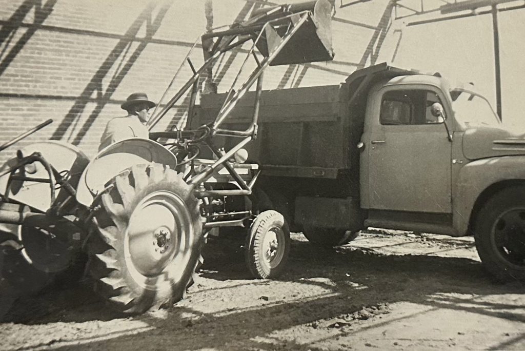 1950’s great grandpa loading out dump truck